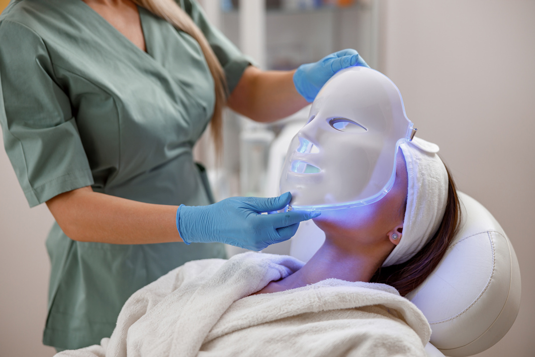 Cosmetic Procedure with LED Facial Mask for Female Face. Photon
